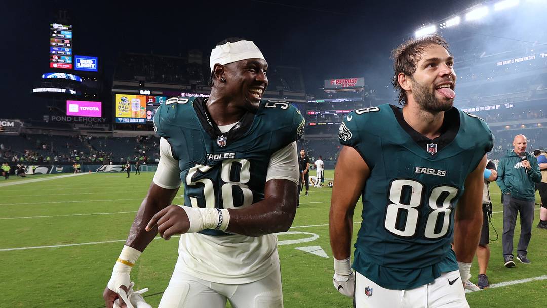 Sep 13, 2026; Philadelphia, Pennsylvania, USA;  Philadelphia Eagles linebacker Jalyx Hunt (58) celebrates with Philadelphia Eagles tight end Dallas Goedert (88) after the game against the Washington Commanders at Lincoln Financial Field.  Mandatory Credit: Bill Streicher-Imagn Images