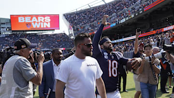 Sep 8, 2024; Chicago, Illinois, USA; Chicago Bears quarterback Caleb Williams (18) celebrates after the Bears beat the Tennessee Titans at Soldier Field. Mandatory Credit: David Banks-Imagn Images
