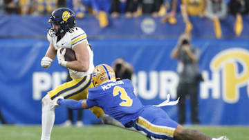 Oct 12, 2024; Pittsburgh, Pennsylvania, USA;  California Golden Bears tight end Jack Endries (87) runs after  catch against Pittsburgh Panthers defensive back Donovan McMillon (3) during the fourth quarter at Acrisure Stadium. Pittsburgh won 17-15. Mandatory Credit: Charles LeClaire-Imagn Images