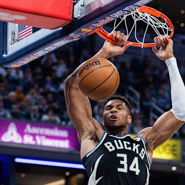 Nov 3, 2025; Indianapolis, Indiana, USA; Milwaukee Bucks forward Giannis Antetokounmpo (34) shoots the ball while Indiana Pacers guard/forward Aaron Nesmith (23)  defends in the second half at Gainbridge Fieldhouse. Mandatory Credit: Trevor Ruszkowski-Imagn Images