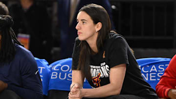 Sep 7, 2025; Baltimore, MD, USA; Indiana Fever guard Caitlin Clark (22) looks on from the bench against the Washington Mystics during the first quarter at CFG Bank Arena. Mandatory Credit: Rafael Suanes-Imagn Images