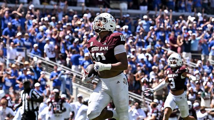 Sep 12, 2026; College Station, Texas, USA; Texas A&M Aggies defensive end Marco Jones (10) intercepts a pass running it back for a touchdown during the fourth quarter against Arizona State Sun Devils at Kyle Field. Mandatory Credit: Maria Lysaker-Imagn Images