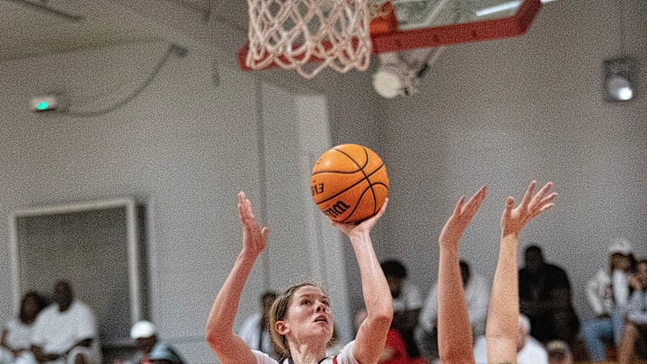 Maddie O'Berski of ECS takes a shot over Sophia McCartney of St. John Neumann in the Private 8 Girls Basketball Championship game on Friday, Jan. 19, 2024, at Evangelical Christian School in Fort Myers.