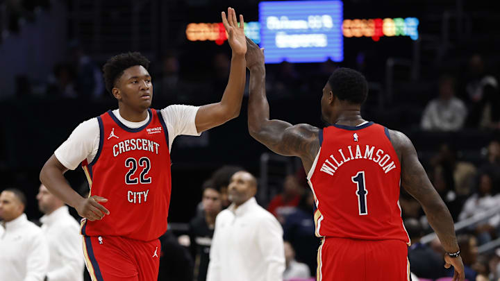Jan 9, 2026; Washington, District of Columbia, USA; New Orleans Pelicans center Derik Queen (22) celebrates with Pelicans forward Zion Williamson (1) against the Washington Wizards in the second half at Capital One Arena. Mandatory Credit: Geoff Burke-Imagn Images