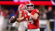 Nov 28, 2025; Atlanta, Georgia, USA; Georgia Bulldogs quarterback Gunner Stockton (14) warms up before a game against the Georgia Tech Yellow Jackets at Mercedes-Benz Stadium. Mandatory Credit: Brett Davis-Imagn Images
