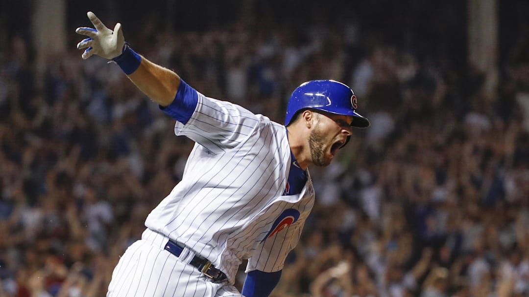 Aug 12, 2018; Chicago, IL, USA; Chicago Cubs third baseman David Bote (13) reacts after hitting game winning grand slam against the Washington Nationals at Wrigley Field. Mandatory Credit: Kamil Krzaczynski-Imagn Images