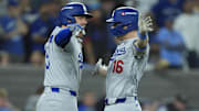 Nov 1, 2025; Toronto, Ontario, CAN; Los Angeles Dodgers catcher Will Smith (16) celebrates with first baseman Freddie Freeman (5) after hitting a home run against the Toronto Blue Jays in the eleventh inning during game seven of the 2025 MLB World Series at Rogers Centre. Mandatory Credit: John E. Sokolowski-Imagn Images
