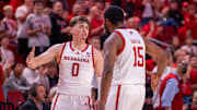 Nebraska guard Connor Essegian celebrates with teammate Jared Garcia after a second-half bucket against BYU.