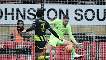 Josh Keeley saves from Omar Marmoush