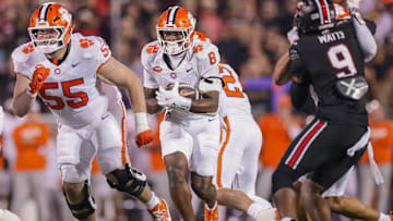 OL Harris Sewell (55) leads the way for RB Adam Randall (8) in  Clemson v Louisville game 