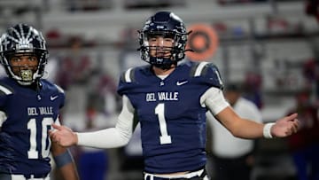 Del Valle High School's Jake Fette talks to his sideline during their game against Cooper High School at Del Valle High School on Nov. 14, 2024. Del Valley won their opening playoff game.