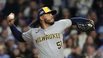 Oct 9, 2025; Chicago, Illinois, USA; Milwaukee Brewers pitcher Freddy Peralta (51) throws pitch against the Chicago Cubs during the first inning for game four of the NLDS round for the 2025 MLB playoffs at Wrigley Field. Mandatory Credit: David Banks-Imagn Images
