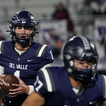 Del Valle High School's Jake Fette looks to make a throw during play against Cooper High School at Del Valle High School on Nov. 14, 2024. Del Valle won their opening playoff game.