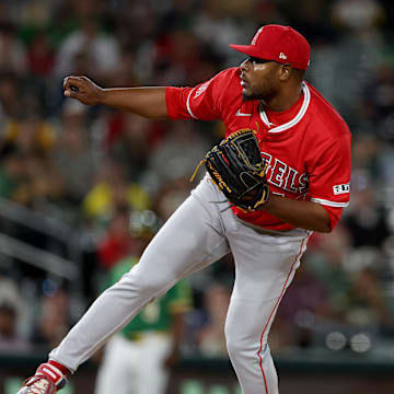 May 19, 2025; West Sacramento, California, USA; Los Angeles Angels pitcher Hector Neris (54) delivers a pitch against the Athletics during the eighth inning at Sutter Health Park. Mandatory Credit: Dennis Lee-Imagn Images