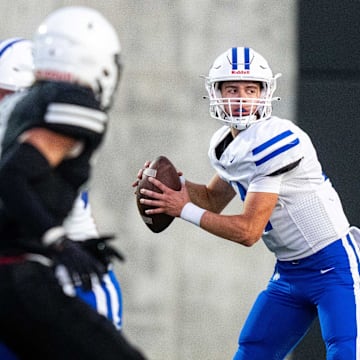 Waukee Northwest's Mack Heitland (14) looks to his receivers during a game against Des Moines Roosevelt on Thursday, Sept. 12, 2024, at Mediacom Stadium in Des Moines.