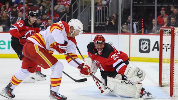 Markstrom alongside Luke Hughes, both needing a new deal, facing off against the former's previous team.