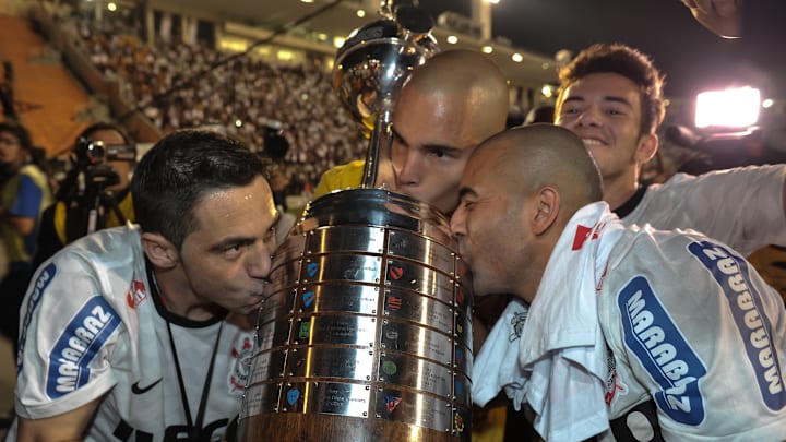 Brazil's Corinthians teammates kiss the 