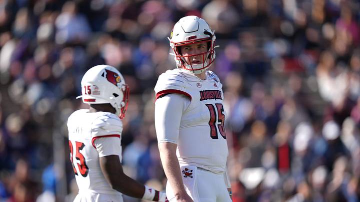 Louisville quarterback Harrison Bailey looks over to his team in between plays during a run against Washington of the Tony the Tiger Sun Bowl game on Dec. 31, 2024.