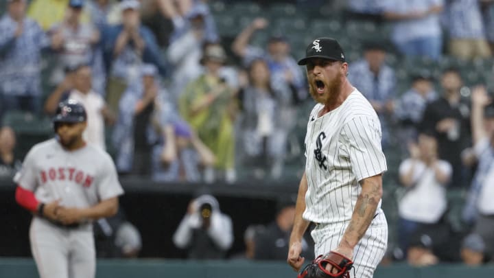Jun 8, 2024; Chicago, Illinois, USA; Chicago White Sox relief pitcher Michael Kopech (34) reacts after striking out Boston Red Sox outfielder Jarren Duran for a final out during the ninth inning at Guaranteed Rate Field. Mandatory Credit: Kamil Krzaczynski-USA TODAY Sports