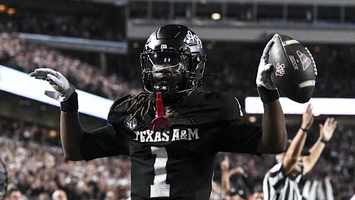 Oct 4, 2025; College Station, Texas, USA; Texas A&M Aggies wide receiver Mario Craver (1) celebrates after scoring a touchdown during the fourth quarter against the Mississippi State Bulldogs at Kyle Field. Mandatory Credit: Maria Lysaker-Imagn Images 