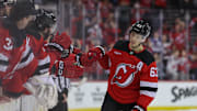 Mar 31, 2025; Newark, New Jersey, USA; New Jersey Devils left wing Jesper Bratt (63) celebrates his goal against the Minnesota Wild during the overtime shootout at Prudential Center. Mandatory Credit: Ed Mulholland-Imagn Images
