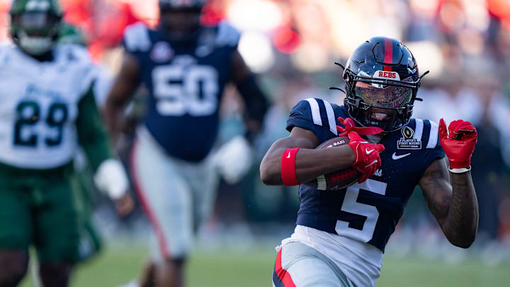 Ole Miss running back Kewan Lacy (5) runs the ball and scores a touchdown during the first round of the College Football Playoff against Tulane at Vaught-Hemingway Stadium in Oxford, Miss., on Saturday, Dec. 20, 2025.