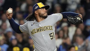 Oct 9, 2025; Chicago, Illinois, USA; Milwaukee Brewers pitcher Freddy Peralta (51) throws pitch against the Chicago Cubs during the first inning for game four of the NLDS round for the 2025 MLB playoffs at Wrigley Field. Mandatory Credit: David Banks-Imagn Images