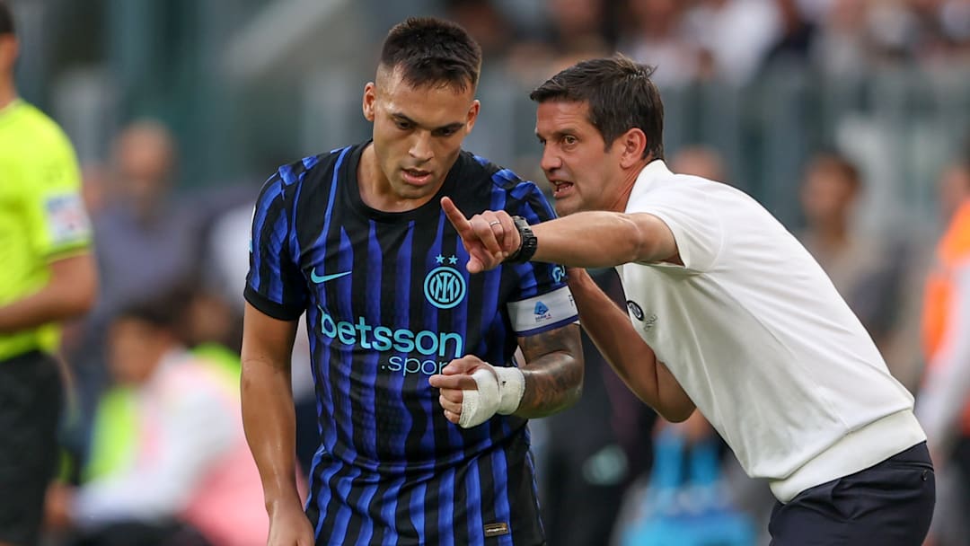 Lautaro Martinez (L) and Coach Cristian Chivu of Inter (R)...
