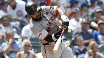 Jun 19, 2024; Chicago, Illinois, USA; San Francisco Giants outfielder Heliot Ramos (17) grounds into force out against the Chicago Cubs during the sixth inning at Wrigley Field. Mandatory Credit: Kamil Krzaczynski-USA TODAY Sports