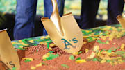 Gold shovel with Athletics on it in the dirt as the team's ceremonial groundbreaking in Las Vegas