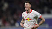 Benjamin Sesko of RB Leipzig celebrates after scoring a goal...