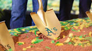 Gold shovel with Athletics on it in the dirt as the team's ceremonial groundbreaking in Las Vegas