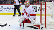 Apr 25, 2025; Newark, New Jersey, USA; Carolina Hurricanes goaltender Frederik Andersen (31) makes a save against the New Jersey Devils during the first overtime in game three of the first round of the 2025 Stanley Cup Playoffs at Prudential Center. Mandatory Credit: Ed Mulholland-Imagn Images