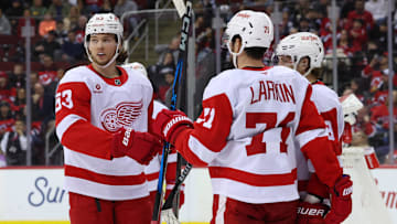 Apr 16, 2025; Newark, New Jersey, USA; Detroit Red Wings center Dylan Larkin (71) celebrates his goal against the New Jersey Devils during the third period at Prudential Center. Mandatory Credit: Ed Mulholland-Imagn Images