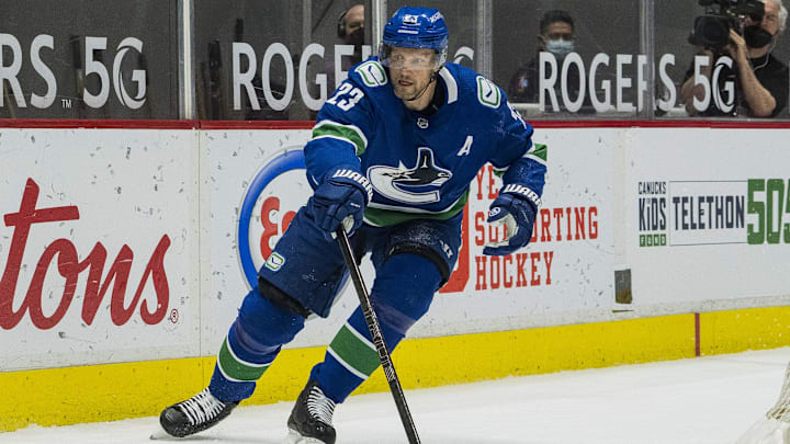 Apr 18, 2021; Vancouver, British Columbia, CAN;  Vancouver Canucks defenseman Alexander Edler (23) skates against the Toronto Maple Leafs at Rogers Arena. Canucks won 3- 2 in Overtime. Mandatory Credit: Bob Frid-Imagn Images