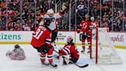Jan 18, 2025; Newark, New Jersey, USA; Philadelphia Flyers right wing Bobby Brink (10) scores a goal on New Jersey Devils goaltender Jake Allen (34) during the third period at Prudential Center. Mandatory Credit: Ed Mulholland-Imagn Images