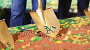 Gold shovel with Athletics on it in the dirt as the team's ceremonial groundbreaking in Las Vegas