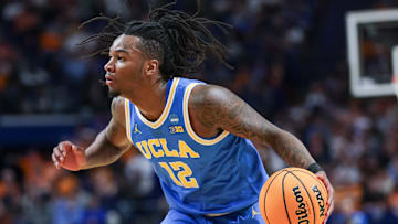 UCLA Bruins guard Sebastian Mack (12) looks to drive on a defender, in a game versus the Tennessee Volunteers this season.