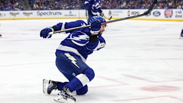 Nikita Kucherov shooting the puck against the Nashville Predators