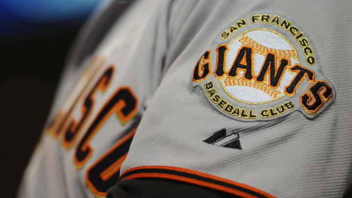 July 15, 2011; San Diego, CA, USA; General view of a San Francisco Giants logo on the sleeve of right fielder Nate Schierholtz (12) during the fifth inning against the San Diego Padres at Petco Park.  Mandatory Credit: Christopher Hanewinckel-USA TODAY Sports