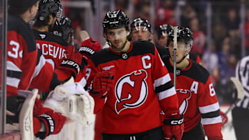 Apr 5, 2025; Newark, New Jersey, USA; New Jersey Devils center Nico Hischier (13) celebrates his goal against the New York Rangers during the third period at Prudential Center. Mandatory Credit: Ed Mulholland-Imagn Images