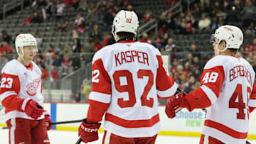 Apr 16, 2025; Newark, New Jersey, USA; Detroit Red Wings center Marco Kasper (92) celebrates his goal against the New Jersey Devils during the third period at Prudential Center. Mandatory Credit: Ed Mulholland-Imagn Images,
