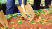 Gold shovel with Athletics on it in the dirt as the team's ceremonial groundbreaking in Las Vegas