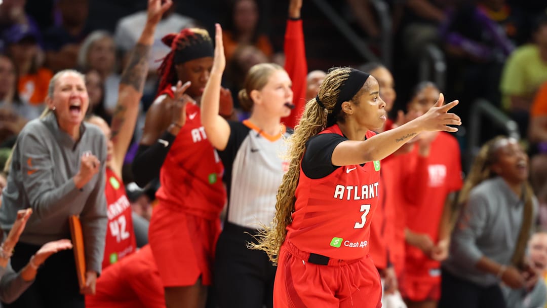 Aug 10, 2025; Phoenix, Arizona, USA; Atlanta Dream guard Jordin Canada (3) celebrates a three pointer against the Phoenix Mercury in the second half at PHX Arena. Mandatory Credit: Mark J. Rebilas-Imagn Images