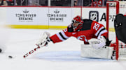 Jan 22, 2025; Newark, New Jersey, USA; New Jersey Devils goaltender Jacob Markstrom (25) makes a save against the Boston Bruins during the first period at Prudential Center. Mandatory Credit: Ed Mulholland-Imagn Images