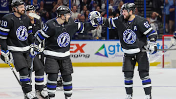 Nikita Kucherov and Brayden Point celebrating a goal in the final game of the 2023-24 regular season against the Toronto Maple Leafs