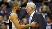 January 2, 2010; Washington, DC, USA; San Antonio Spurs guard Tony Parker (9) talks with head coach Greg Popovich (R) against the Washington Wizards at Verizon Center. The Spurs won 97-86. Mandatory Credit: Geoff Burke-Imagn Images