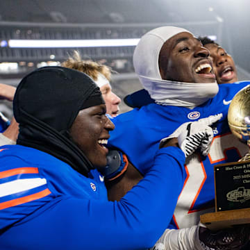 Gulfport players celebrate winning the MHSAA Class 7A state championship title game against Tupelo at Davis Wade Stadium, in Starkville, Miss., on Saturday, Dec. 6, 2025.