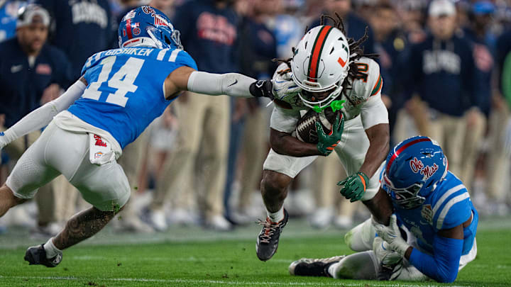 Miami Hurricanes wide receiver Malachi Toney (10) runs the ball during the CFP Fiesta Bowl against Ole Miss at the State Farm Stadium, in Glendale, Ariz., on Thursday, Jan. 8, 2026.