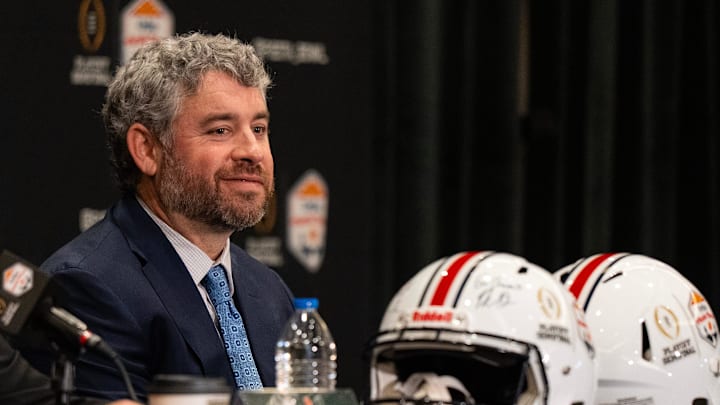 Ole Miss Head Coach Pete Golding smiles while Miami Head Coach Mario Cristobal answers a question during a CFP and Fiesta Bowl press conference at the JW Marriott Scottsdale Camelback Inn Resort & Spa, in Scottsdale, Ariz., on Wednesday, Jan. 7, 2026.